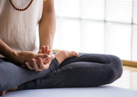 A woman practicing Yoga