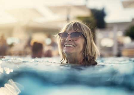 Woman swimming for pain relief